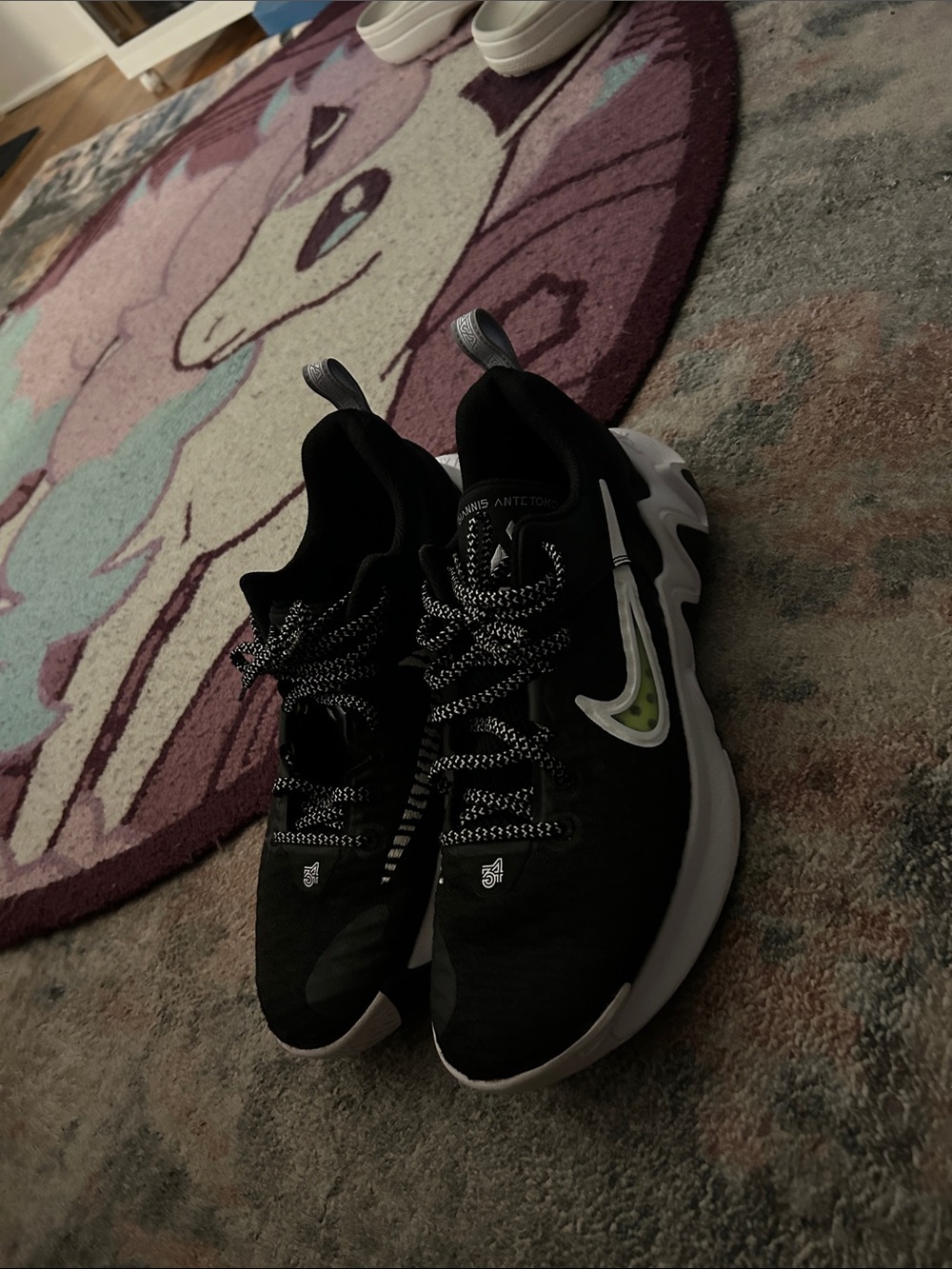 nike immortality 1 black and green